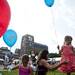 Julia Moe holds a ballon while being with her sisters Isabella and Marisa her friend Samantha Slade and her relative Sharon Ortisi during the Townie Street Party on Monday, July 15. Daniel Brenner I AnnArbor.com